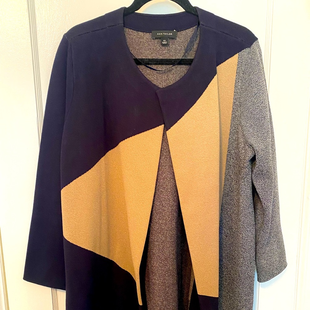 Ladies topper perfect for cooler weather.